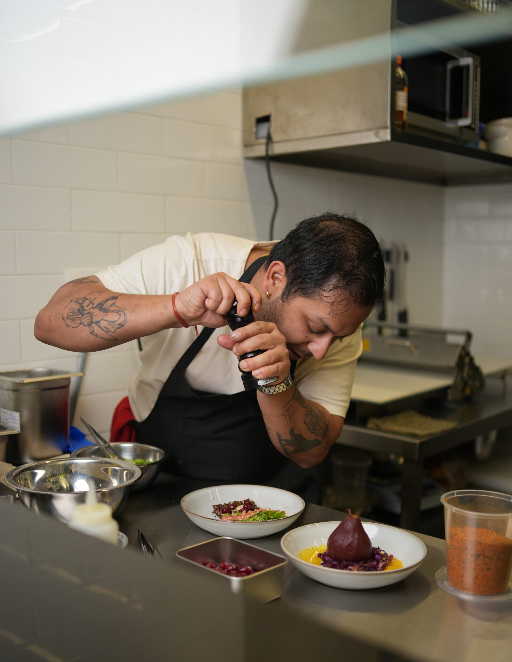 Chef Vedant Newatia cooking in the Atelier V kitchen in Indore
